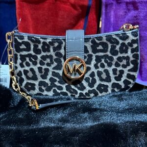 Michael Kors Carmen Small Pouchette shoulder bag in gray leather with leopard.